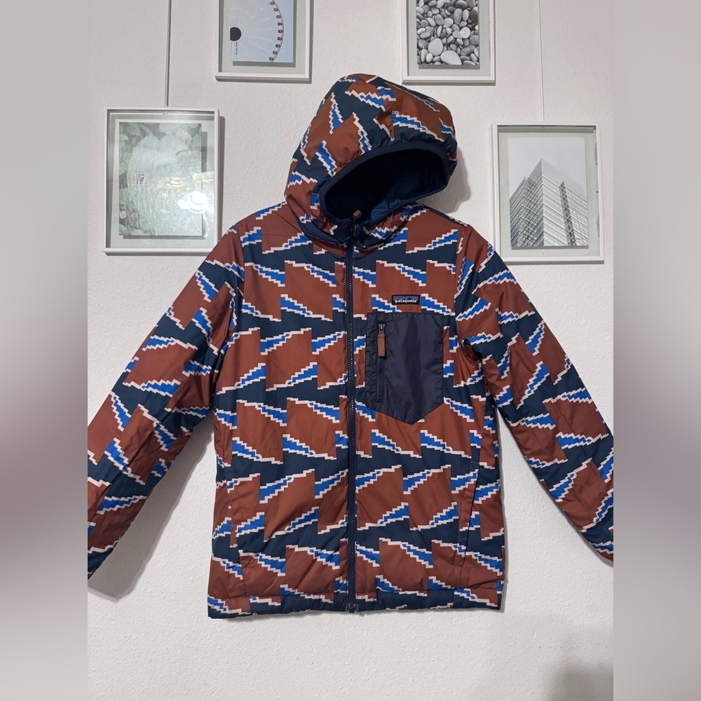 Patagonia Blue and Brown Puffer Jacket with Geometric Design